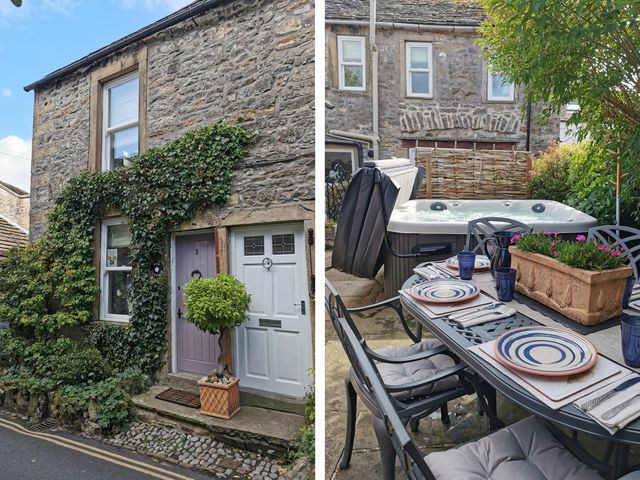An exterior stone wall with two doors and ivy at End Cottage in Grassington