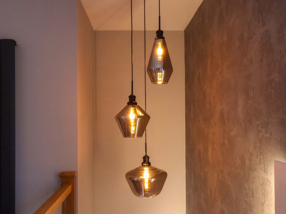 Three pendant lights hanging from the ceiling at 12 Hunley Avenue Brotton near Saltburn-By-The-Sea